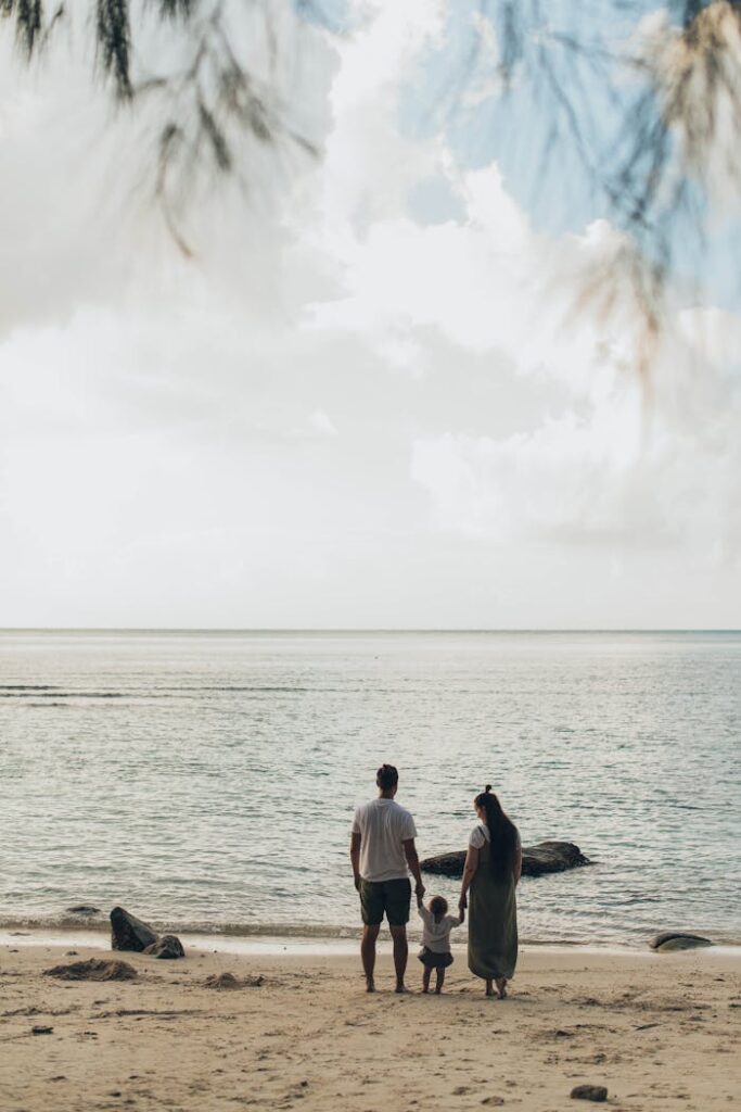 pexels-photo-1914984 Woman and Man Standing at Shores
